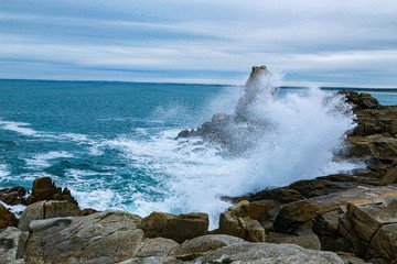 waves crashing on rocks