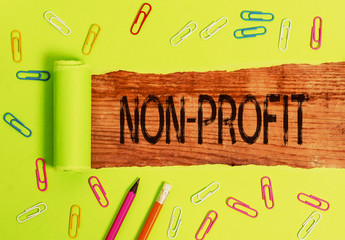Conceptual hand writing showing Non Profit. Concept meaning providing products or service without...