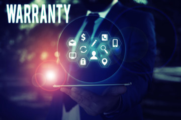 Conceptual hand writing showing Warranty. Concept meaning Free service of repair and maintenance of...
