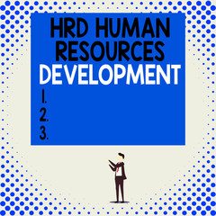 Handwriting text Hrd Huanalysis Resources Development. Conceptual photo helping employees develop demonstratingal skills Isolated view young man standing pointing upwards two hands big rectangle