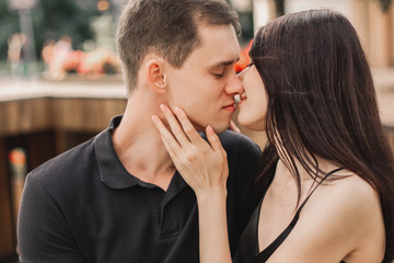 Loving couple hugging in the street.