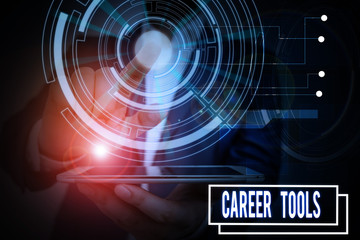 Text sign showing Career Tools. Business photo showcasing the system designed to assist and enhance your career Male human wear formal work suit presenting presentation using smart device