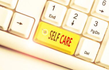 Conceptual hand writing showing Self Care. Concept meaning the practice of taking action to improve...