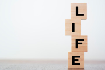 Life word on wooden cubes