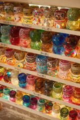 Traditional Turkish colorful ceramics, dishes, bowls, plates, cups, on the souvenir shop of Grand Bazaar.