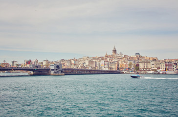 Fototapeta premium Galata Tower, Galata Bridge, Karakoy district and Golden Horn in the early morning light