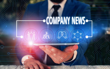 Writing note showing Company News. Business concept for provides news and feature articles about the company status Male wear formal work suit presenting presentation smart device