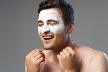portrait of young man with mask on her face