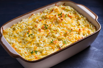 Shepherd's Pie or Cottage Pie. Casserole in baking dish. horizontal image