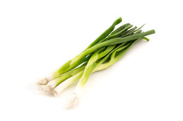organic spring onion, scallion, stalks on white background