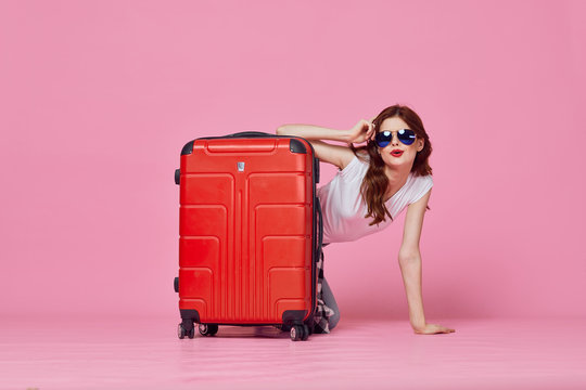 Woman With Suitcase Isolated On White Background