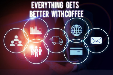 Conceptual hand writing showing Everything Gets Better With Coffee. Concept meaning Have a hot drink when having problems Male wear formal suit presenting presentation smart device