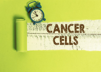 Handwriting text writing Cancer Cells. Conceptual photo forming solid tumors or flooding the blood...