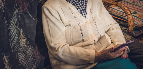 old woman using a cell phone