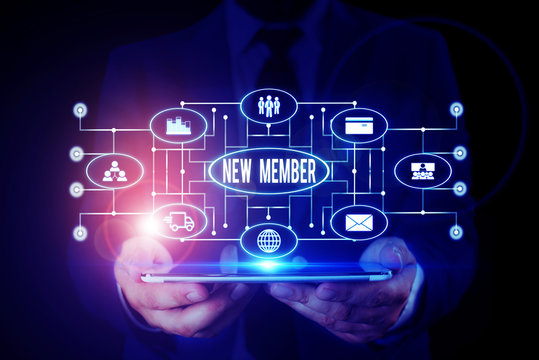 Handwriting text writing New Member. Conceptual photo recruiting employee to company or team Birth of fresh child Male human wear formal work suit presenting presentation using smart device