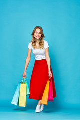 young woman with shopping bags