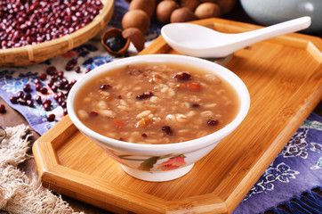 Eight treasure porridge on white wooden table  