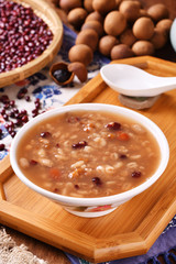 Eight treasure porridge on white wooden table  