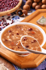 Eight treasure porridge on white wooden table  