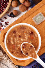 Eight treasure porridge on white wooden table  