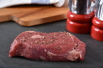 Thick raw beef steak