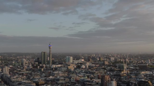Aerial view of BT Tower and buildings rooftops panoramic view at sunrise in London, United Kingdom