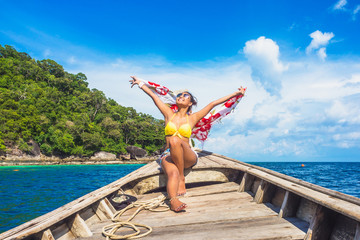Happy woman traveler in bikini joy fun relaxing on boat Surin island Phang-Nga, Famous place tourist travel Phuket Thailand, Tourism beautiful destination Asia, Summer holidays outdoors vacation trip