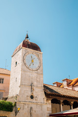 Obraz premium Clock tower and old town square in Trogir, Croatia