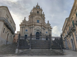 Fototapeta na wymiar Street, church and old buildings of Ragusa Ibla, Sicily Italy