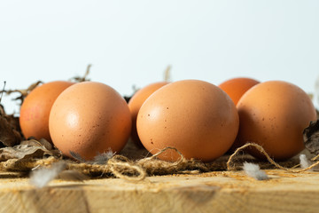 Close up eggs on wooden table