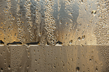 Macro photo of water droplets on the window