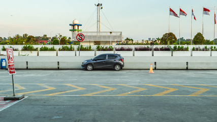 violation to the traffic sign. A car stop under stop restriction sign. lawbreaker
