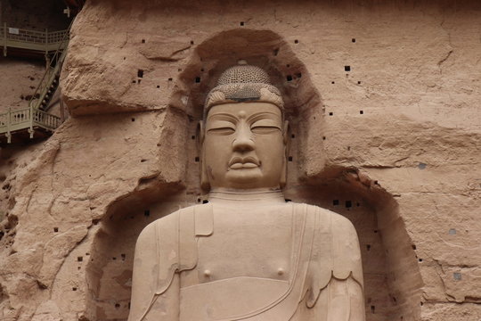 Buddha statue at Bingling Cave Temple in Yongjing, Gansu Province, China.UNESCO World heritage site.(Silk Roads: the Routes Network of Chang'an-Tianshan Corridor)