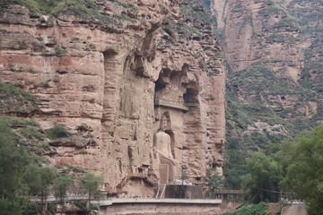 Fototapeta premium Buddha statue at Bingling Cave Temple in Yongjing, Gansu Province, China.UNESCO World heritage site.(Silk Roads: the Routes Network of Chang'an-Tianshan Corridor)