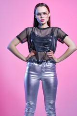 portrait of young woman in leather jacket