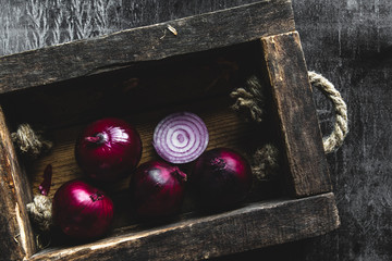 detail of onion inside the box with dark background