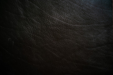 Detail of geniune dark black leather texture