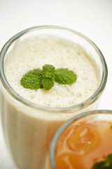Smoothie in glass with mint leaves 