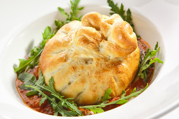 Baked Burrata Cheese with Tomato Sauce and Fresh Arugula Leaves