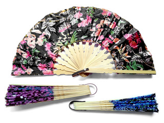 Hand fan from Bali Indonesia. Kipas Tangan Motif Batik or hand fan Batik made of bamboo and batik fabric. Hand fan patterned batik isolated on white background.