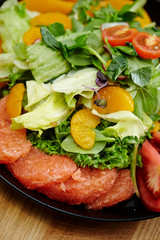 Fruits salad, peach, tangerine and pink grapefruit 