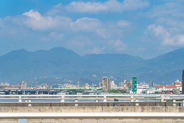 Fototapeta na wymiar Street view on Taipei bridge, a bridge link New Taipei City to Taipei city, Taiwan