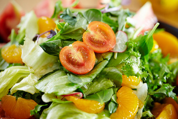 Fruits salad, peach, tangerine and pink grapefruit 