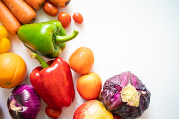Various beta carotene fresh fruit and vegetable on white background