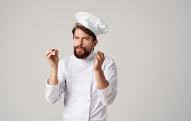 cook in white uniform and hat