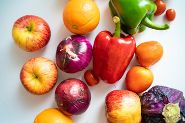 Various beta carotene fresh fruit and vegetable on white background