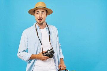 portrait of young man in straw hat