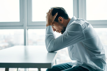 portrait of young man in office