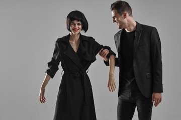 man and woman fighting with gun