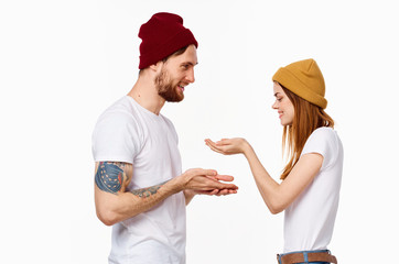 cheerful young couple in t-shirts